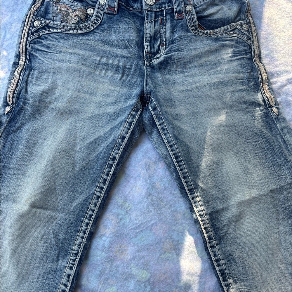 Rock Revival Blue Distressed Jeans not for sale.
